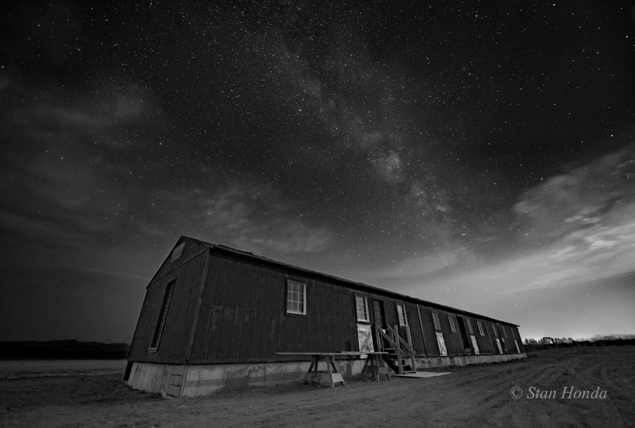 A night scene of an original barracks donated from the Iowa State University geological field camp in Shell, eastern Wyoming, now on the site of the Heart Mountain Interpretive Center.
