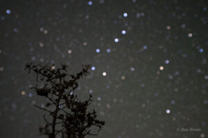 The Big Dipper pointing to the north star Polaris in the Little Dipper.